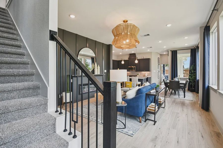 Furnished interior view inside a new home in Meridiana Chateau, Manvel (Image 14).