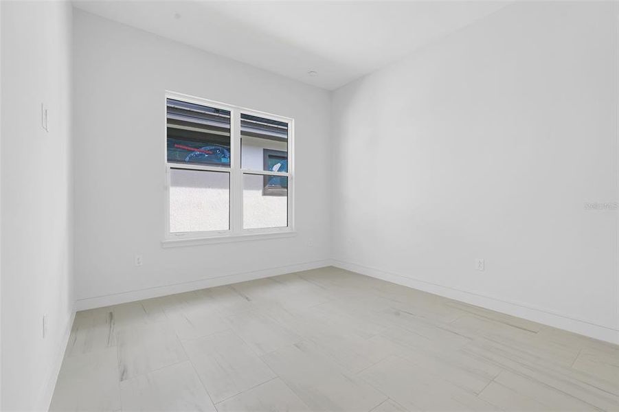 Spacious, unfurnished interior of a new home in Hampton Green at Providence, Davenport (Image 39).