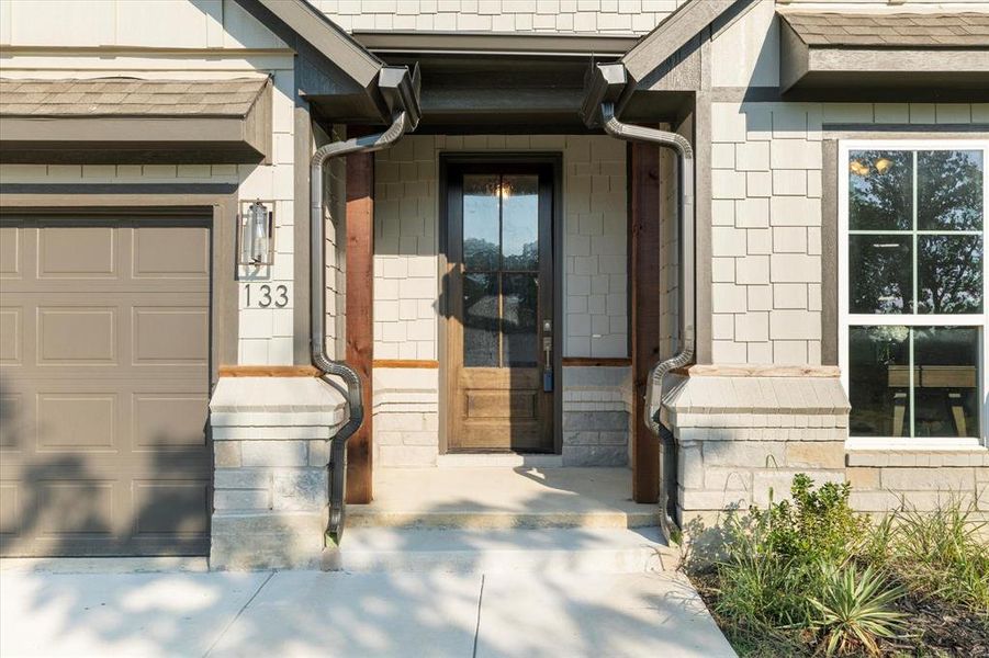 Doorway to property with a garage Doorway to property with a garage