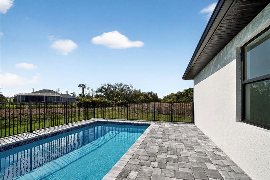 Exterior details and patio area of a home in , Rotonda West (Image 27).