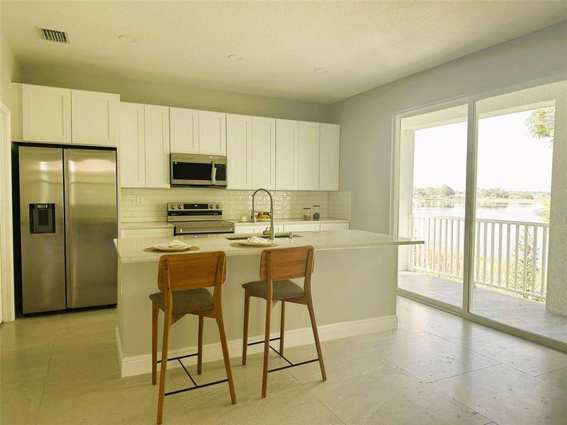 Furnished interior view inside a new home in , Haines City (Image 15). Furnished interior view inside a new home in , Haines City (Image 15).