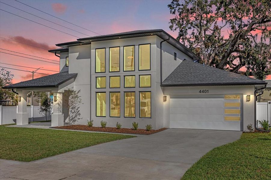 Front exterior of a new home in , Orlando, FL, highlighting curb appeal (Image 26).