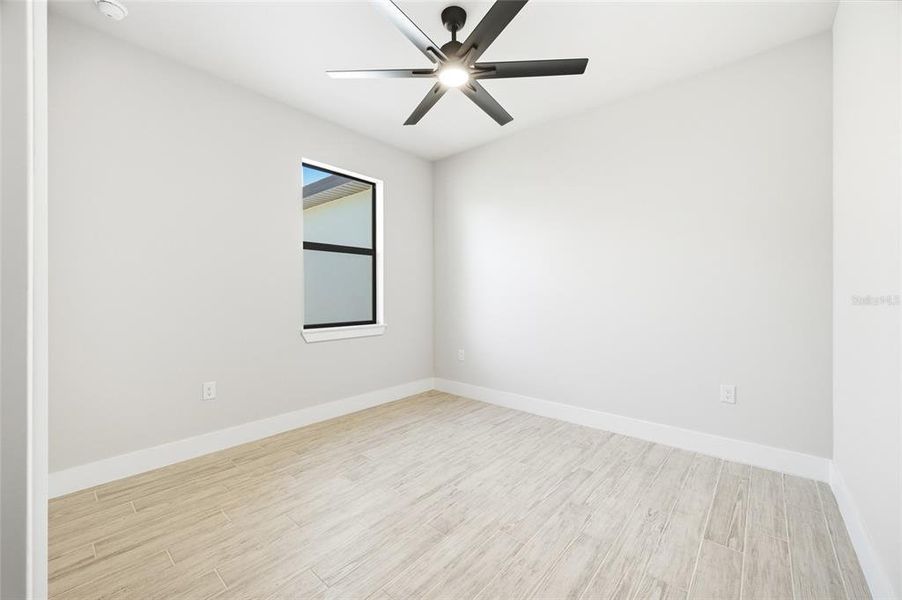 Spacious, unfurnished interior of a new home in , Port Charlotte (Image 23).