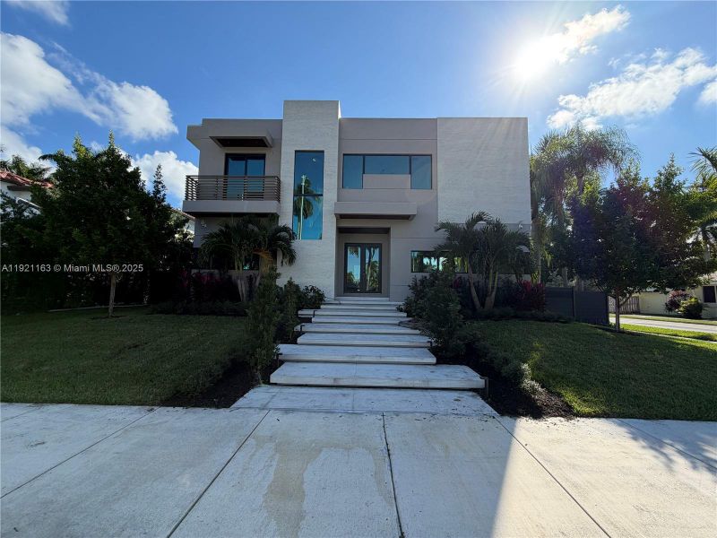 Front exterior of a new home in , Hollywood, FL, highlighting curb appeal (Image 29).