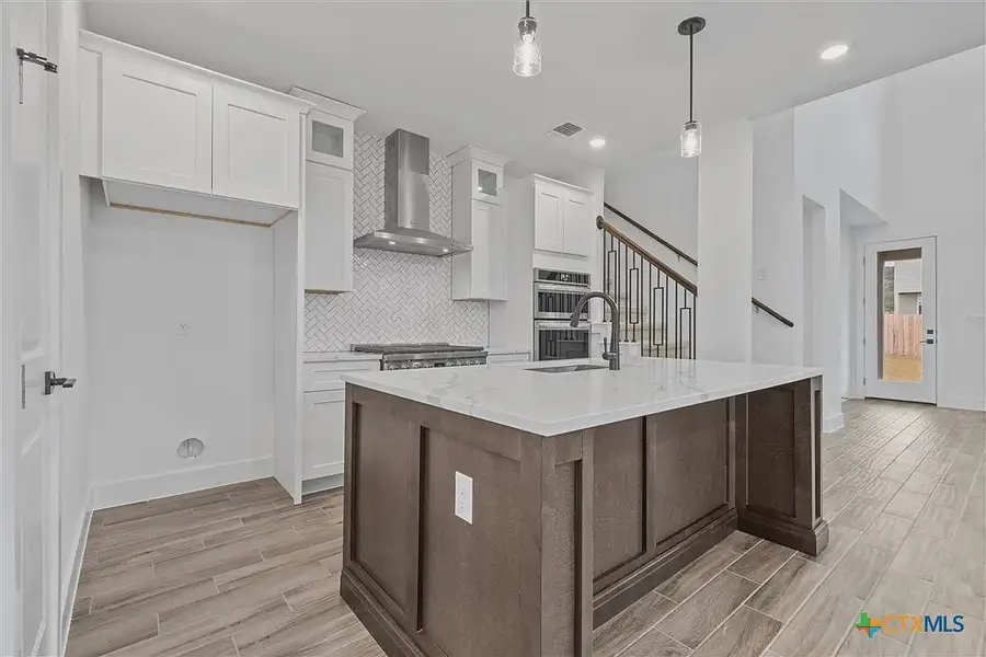Furnished interior view inside a new home in Levy Crossing, Killeen (Image 7).