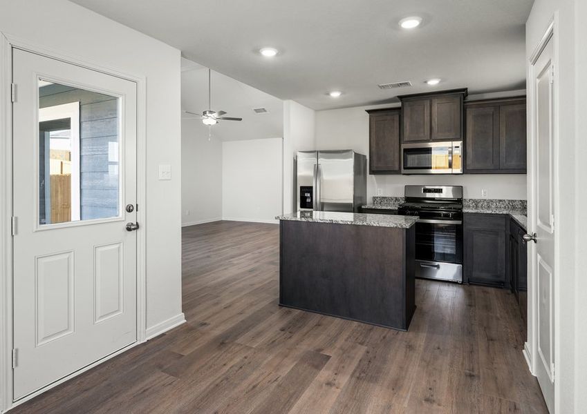 The dining room sits right off of the kitchen. The dining room sits right off of the kitchen.