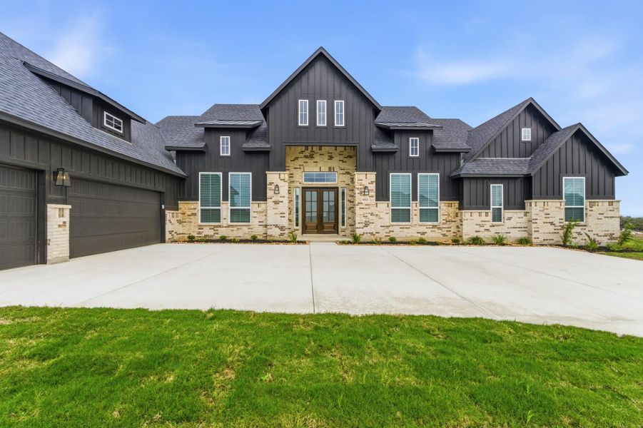 Front exterior of a new home in Regency Ranch, Marion, TX, highlighting curb appeal (Image 29).