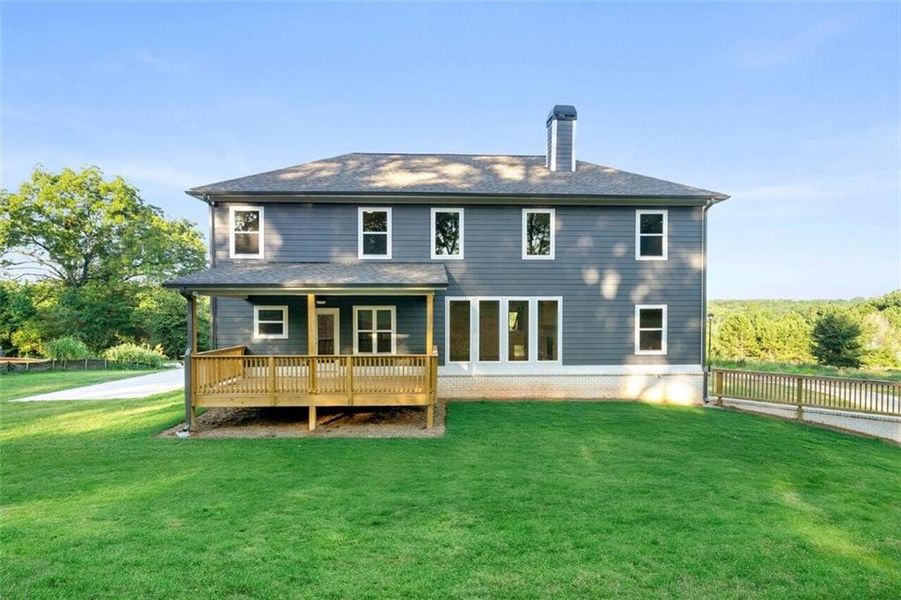 Exterior details and patio area of a home in Steeplechase, Hoschton (Image 4).