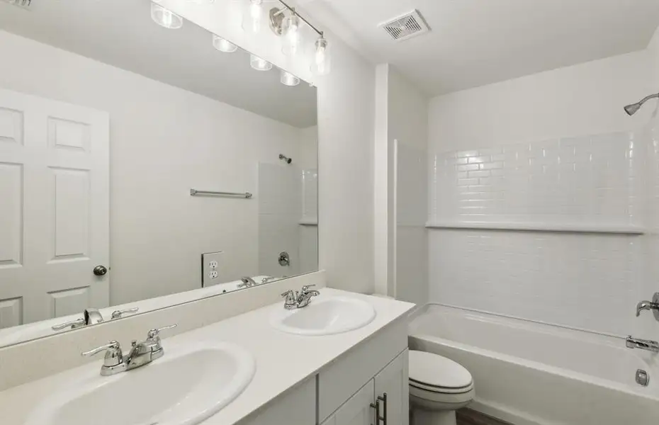 Upgraded secondary bathroom *real home pictured