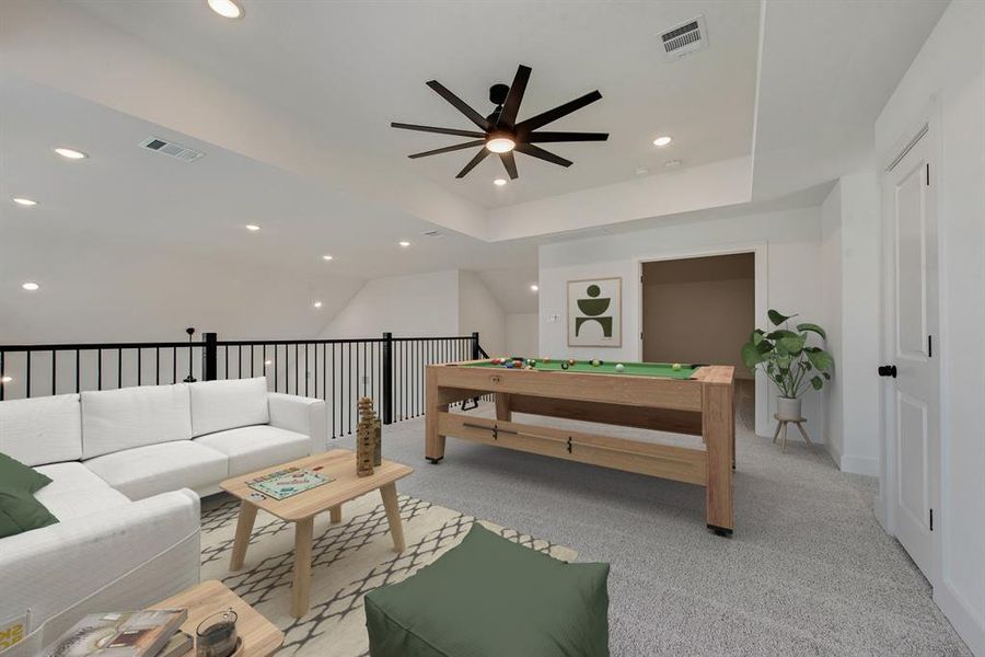 Living room featuring light colored carpet, recessed lighting, ceiling fan, and vaulted ceiling Living room featuring light colored carpet, recessed lighting, ceiling fan, and vaulted ceiling