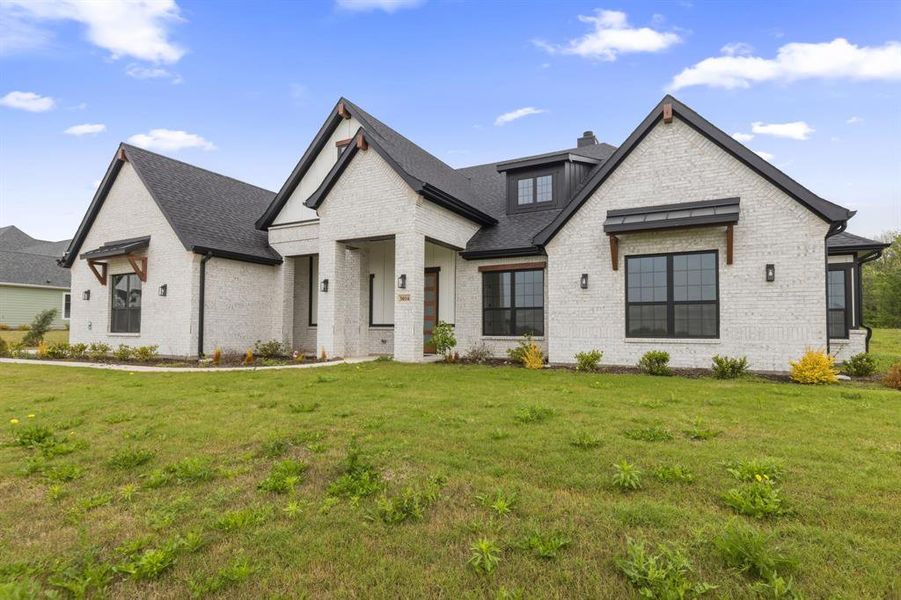 Front exterior of a new home in Capitol Hill, Anna, TX, highlighting curb appeal (Image 26).
