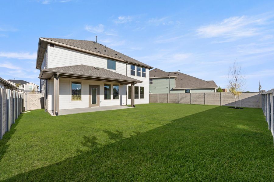 Exterior details and patio area of a home in Painted Tree, McKinney (Image 17).