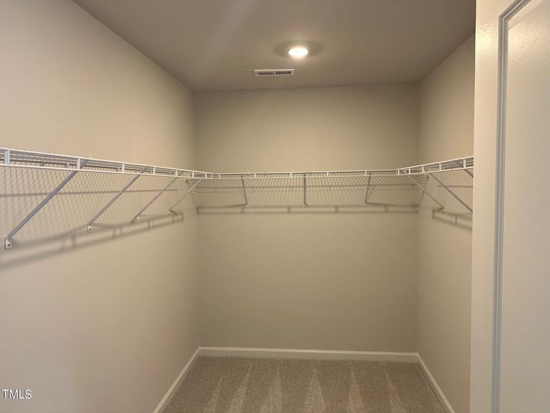 88 primary suite walk in closet