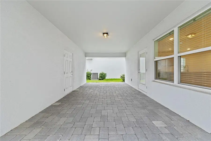 Exterior details and patio area of a home in EverBe, Orlando (Image 3).