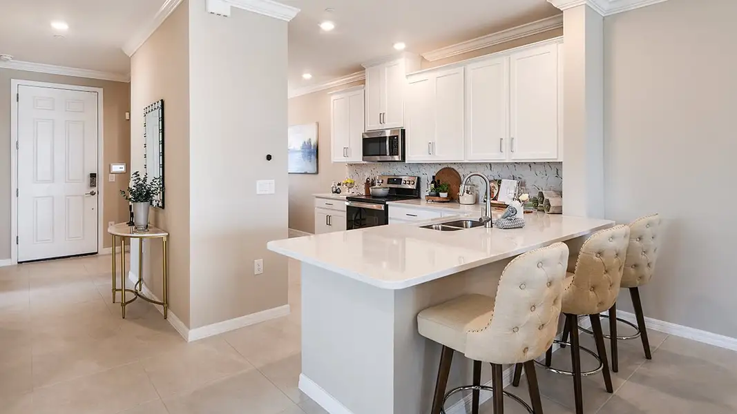Representative furnished interior of a home built from the Avanti VII by Taylor Morrison in Esplanade at Rivergrass Condos, Naples (Image 3).