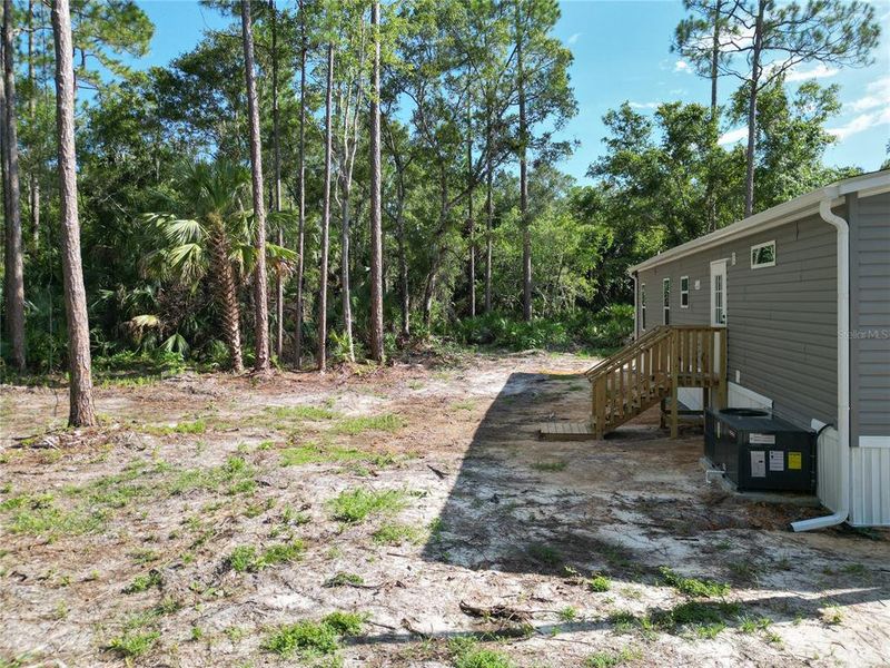 Front exterior of a new home in , Inglis, FL, highlighting curb appeal (Image 19).
