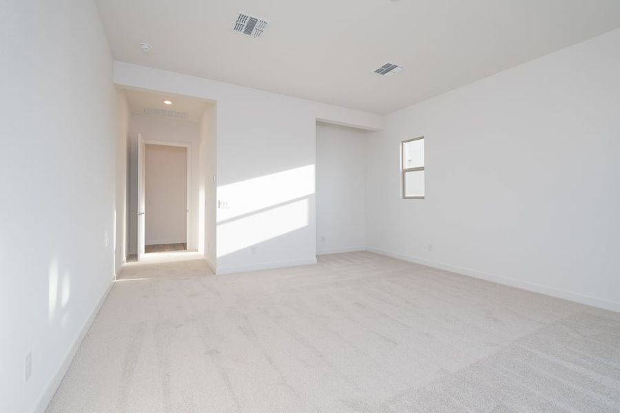 Spacious, unfurnished interior of a new home in Revana at Soleo, San Tan Valley (Image 28).