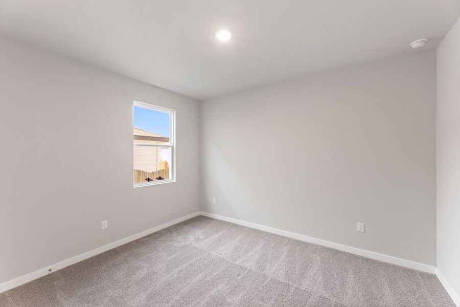 Spacious, unfurnished interior of a new home in Hunters Ranch, San Antonio (Image 18).