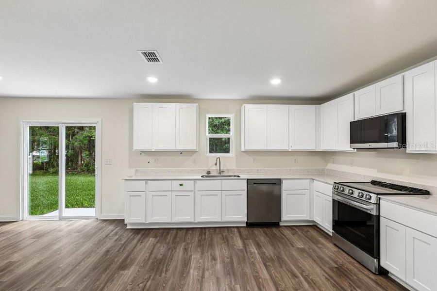 Furnished interior view inside a new home in Baywood Hills, Alachua (Image 5).