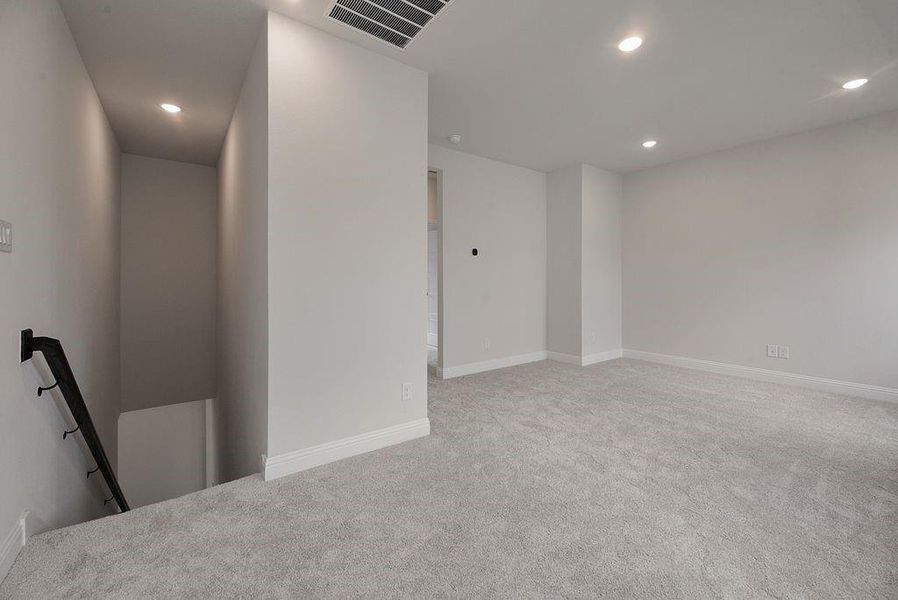 Spacious, unfurnished interior of a new home in Spiritas Ranch, Little Elm (Image 26). Spacious, unfurnished interior of a new home in Spiritas Ranch, Little Elm (Image 26).
