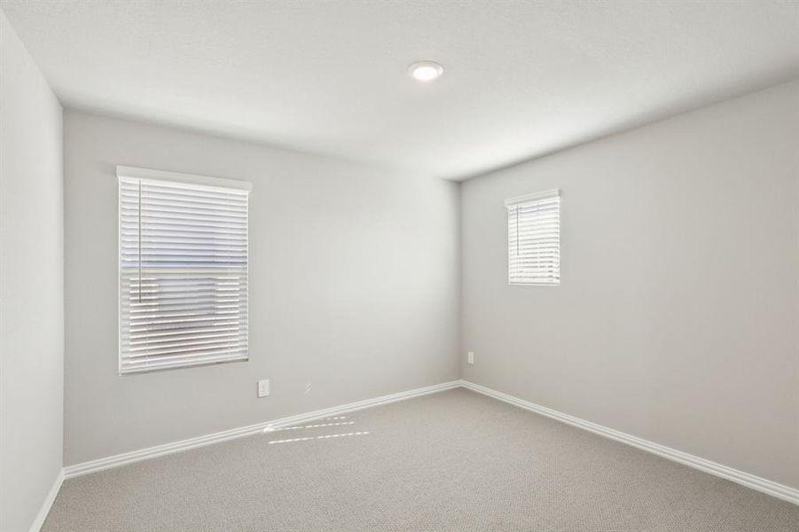 Spacious, unfurnished interior of a new home in Simpson Crossing - Spring Series, McKinney (Image 23).