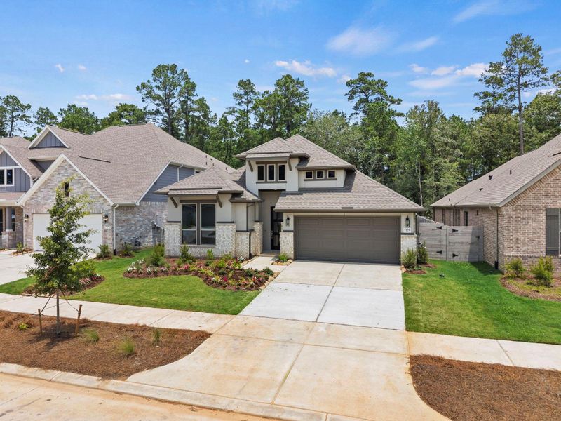 Front exterior of a new home in Two Step Farm, Montgomery, TX, highlighting curb appeal (Image 23). Front exterior of a new home in Two Step Farm, Montgomery, TX, highlighting curb appeal (Image 23).