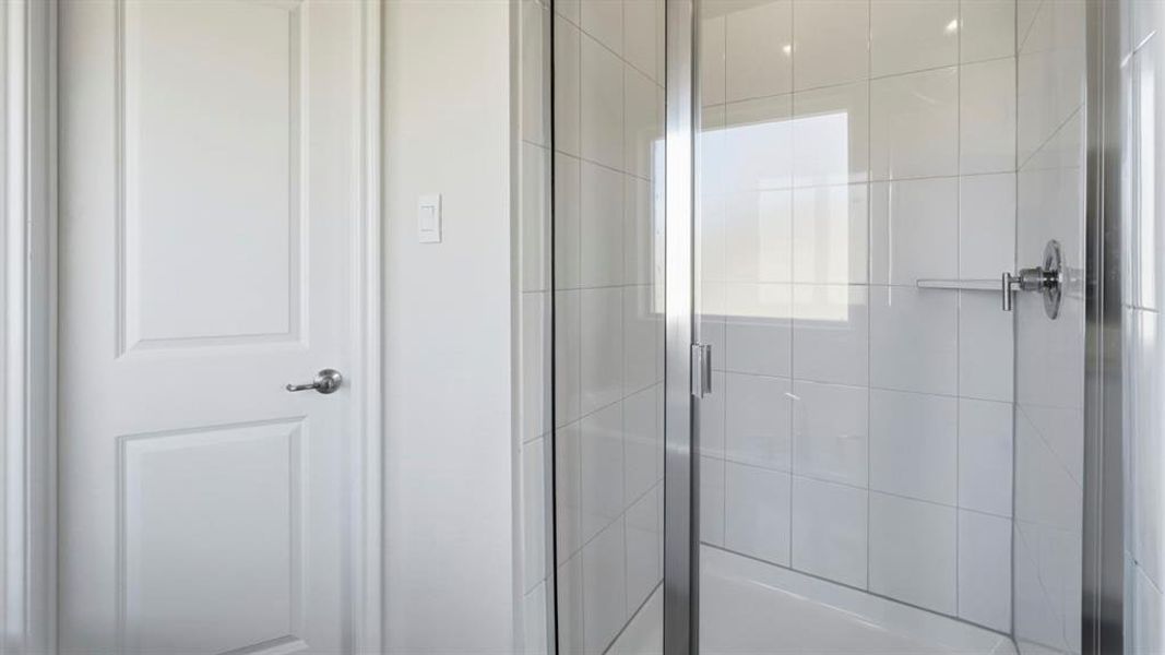 Full bathroom with a stall shower