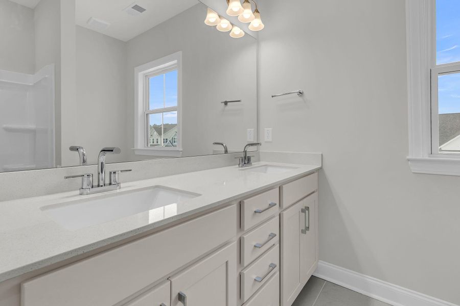 Furnished interior view inside a new home in Tidewater at Lakes of Cane Bay, Summerville (Image 16).