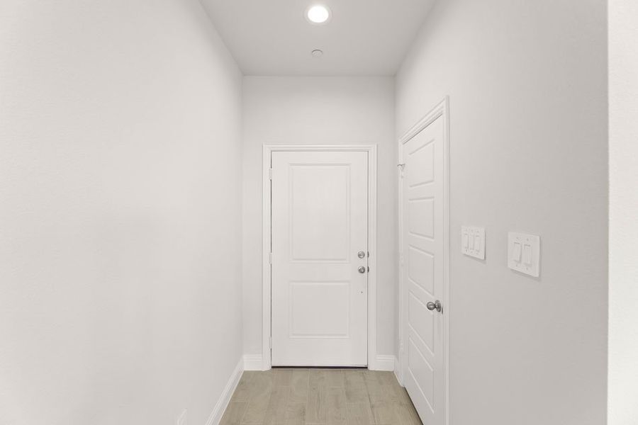 Front exterior of a new home in Main Street Village, Mansfield, TX, highlighting curb appeal (Image 5). Front exterior of a new home in Main Street Village, Mansfield, TX, highlighting curb appeal (Image 5).