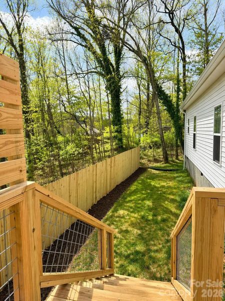 Exterior details and patio area of a home in , Candler (Image 3).