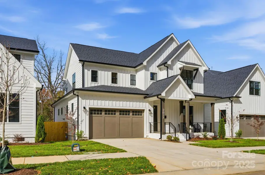 Front exterior of a new home in , Charlotte, NC, highlighting curb appeal (Image 2).