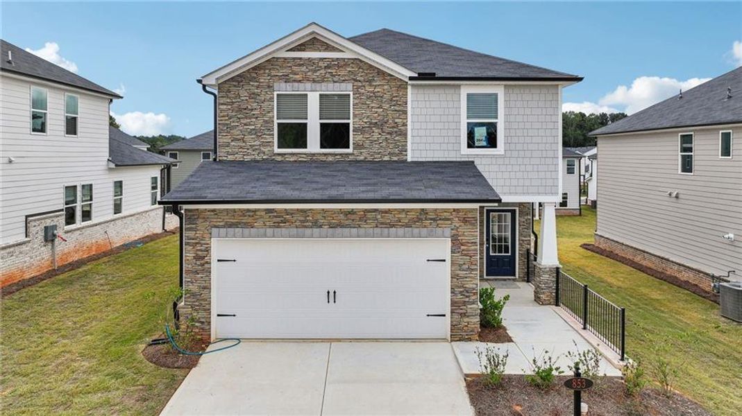 Exterior details and patio area of a home in Martin Springs - Reserve Series, Lawrenceville (Image 19).