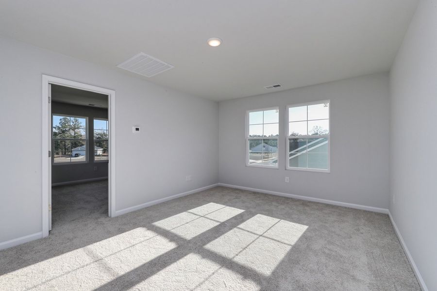 Spacious, unfurnished interior of a new home in Hainer Place, Conway (Image 32).