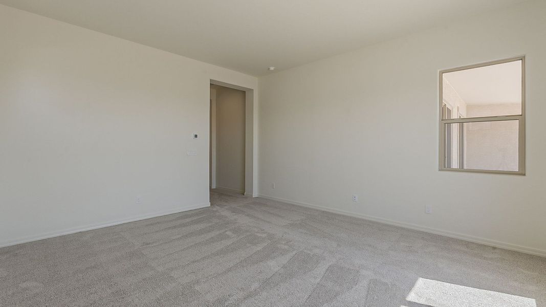 Furnished interior view inside a new home in Windrose, Waddell (Image 28).