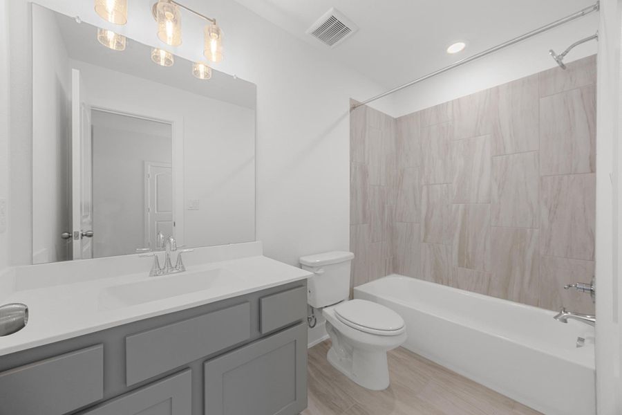 Furnished interior view inside a new home in Parmer Ranch - 40', Georgetown (Image 13).