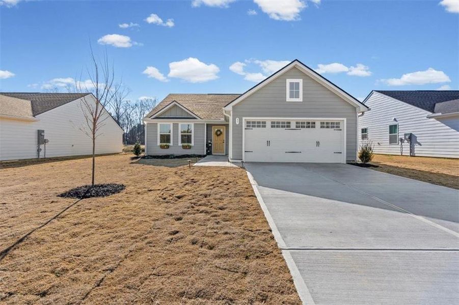 Front exterior of a new home in , Rome, GA, highlighting curb appeal (Image 2). Front exterior of a new home in , Rome, GA, highlighting curb appeal (Image 2).