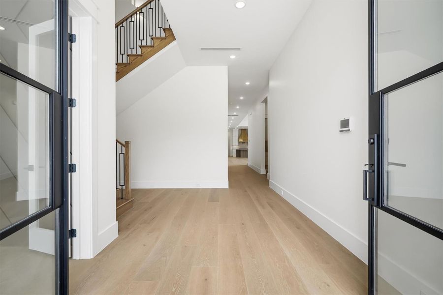 Walk through your double door entrance and see the natural light throughout the home.
