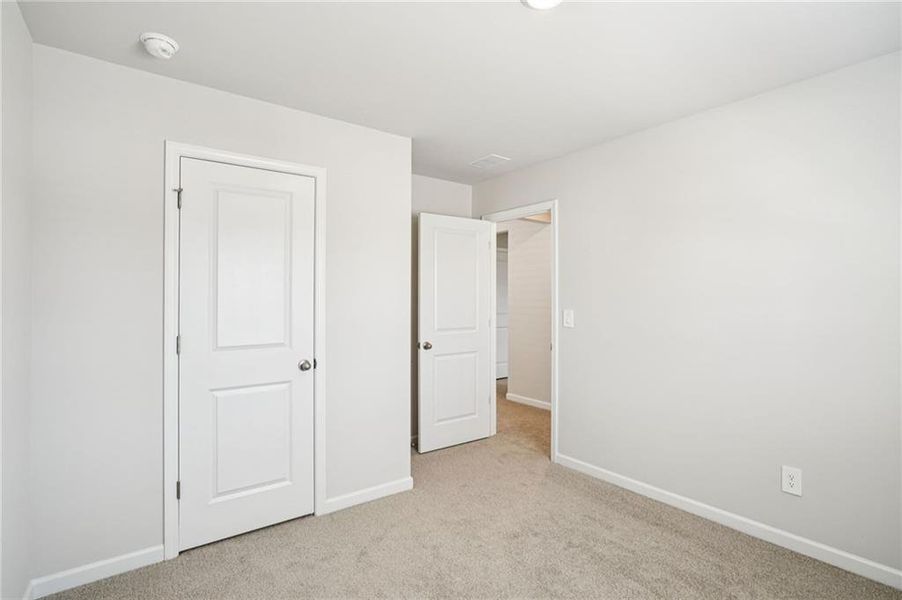 Spacious, unfurnished interior of a new home in Hawthorne Station, College Park (Image 22).