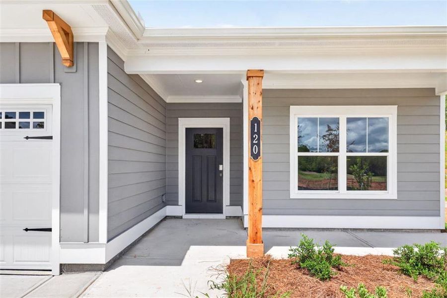 Exterior details and patio area of a home in Summerfield Place, Carrollton (Image 3).