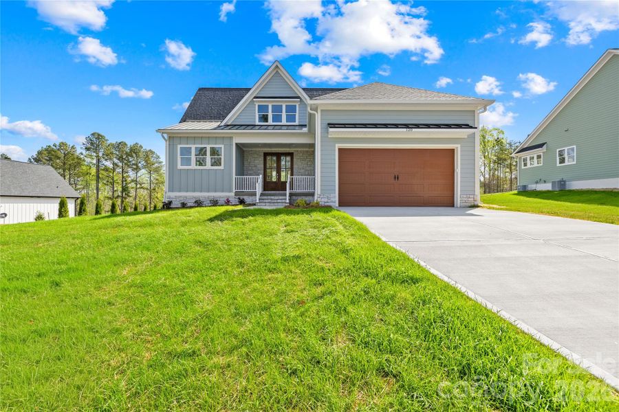 Front exterior of a new home in , Statesville, NC, highlighting curb appeal (Image 2). Front exterior of a new home in , Statesville, NC, highlighting curb appeal (Image 2).
