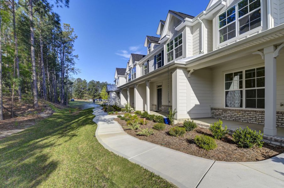 Exterior details and patio area of a home in Lake Carolina Townhomes, Columbia (Image 26).