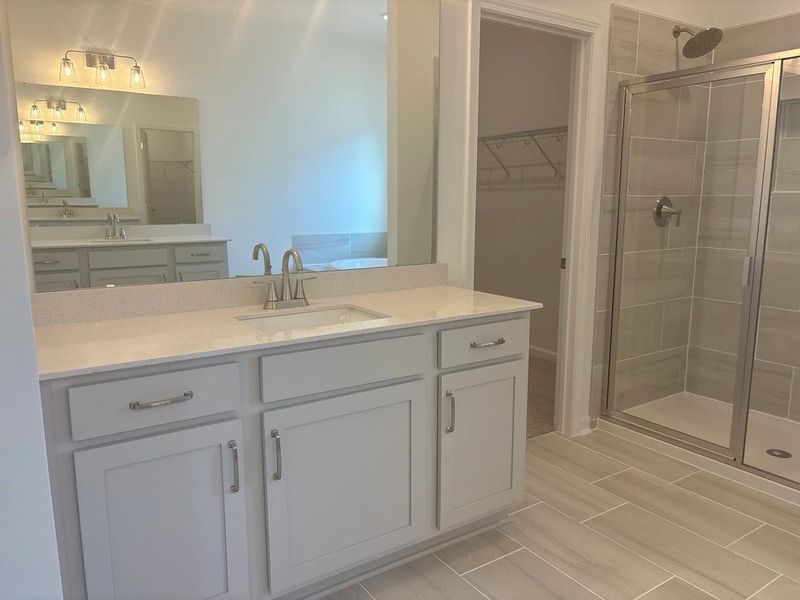 Primary Bath featuring the AW Collection® Milan - Clean geometry and high-contrast finishes.