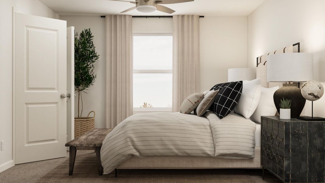 A bedroom with a bed and a lamp.