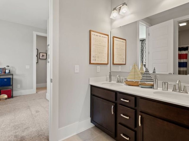 Representative furnished interior of a home built from the Riley P by True Homes in Homecoming, Ravenel (Image 16).