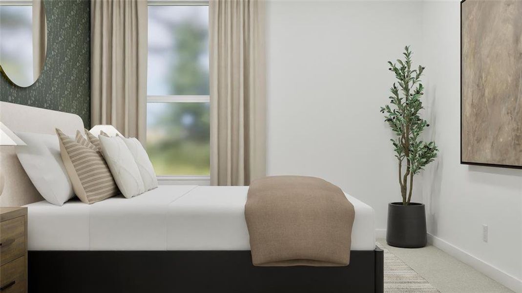 Carpeted bedroom with baseboards