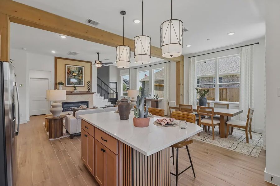 Furnished interior view inside a new home in Meridiana Chateau, Manvel (Image 18).