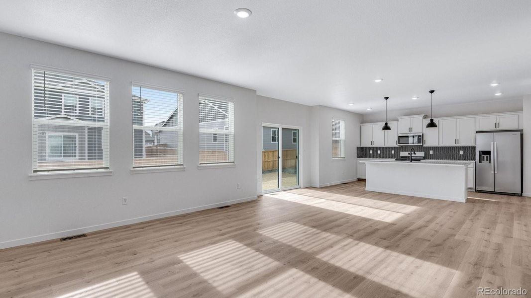 Spacious, unfurnished interior of a new home in Trails at Crowfoot, Parker (Image 21).