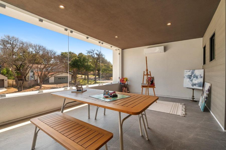 View of patio / terrace with an AC wall unit View of patio / terrace with an AC wall unit