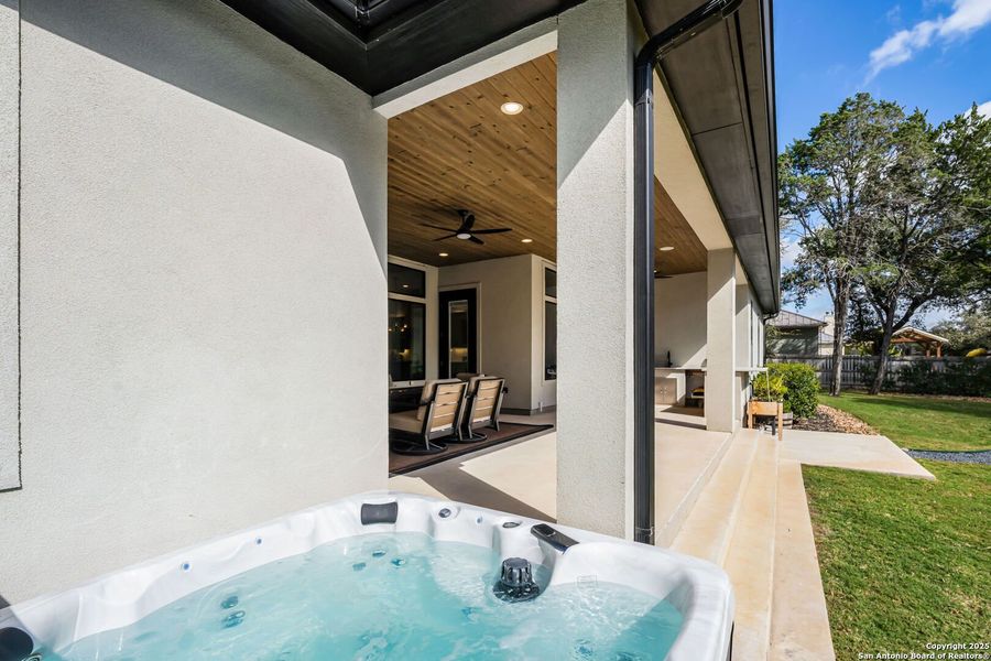 Exterior details and patio area of a home in , New Braunfels (Image 28).