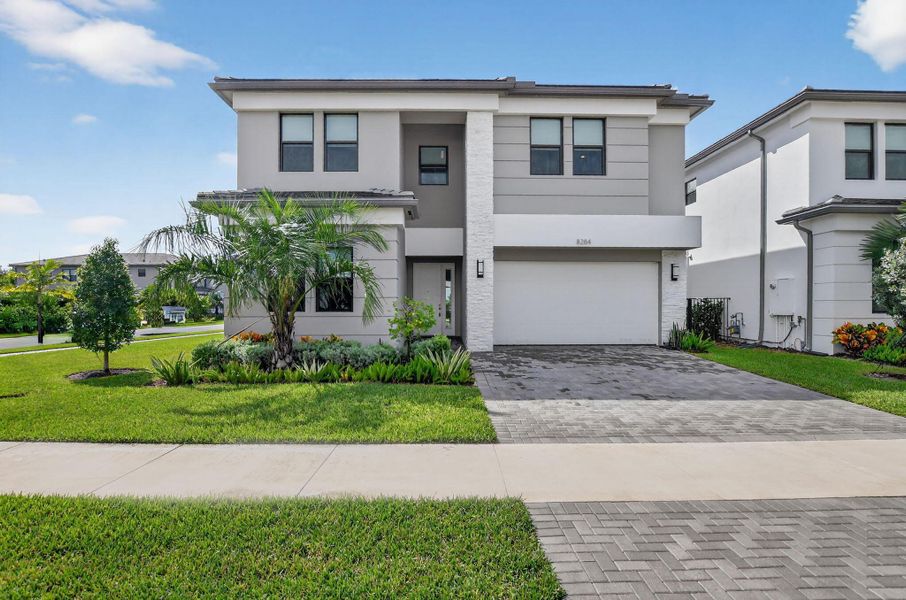Front exterior of a new home in , Boca Raton, FL, highlighting curb appeal (Image 2).